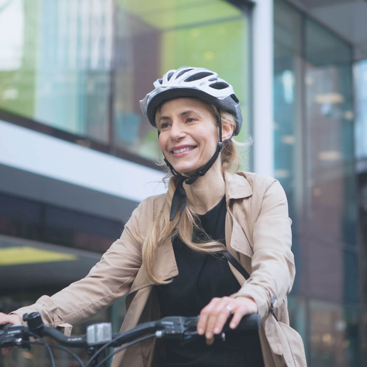 a middle aged women cycling