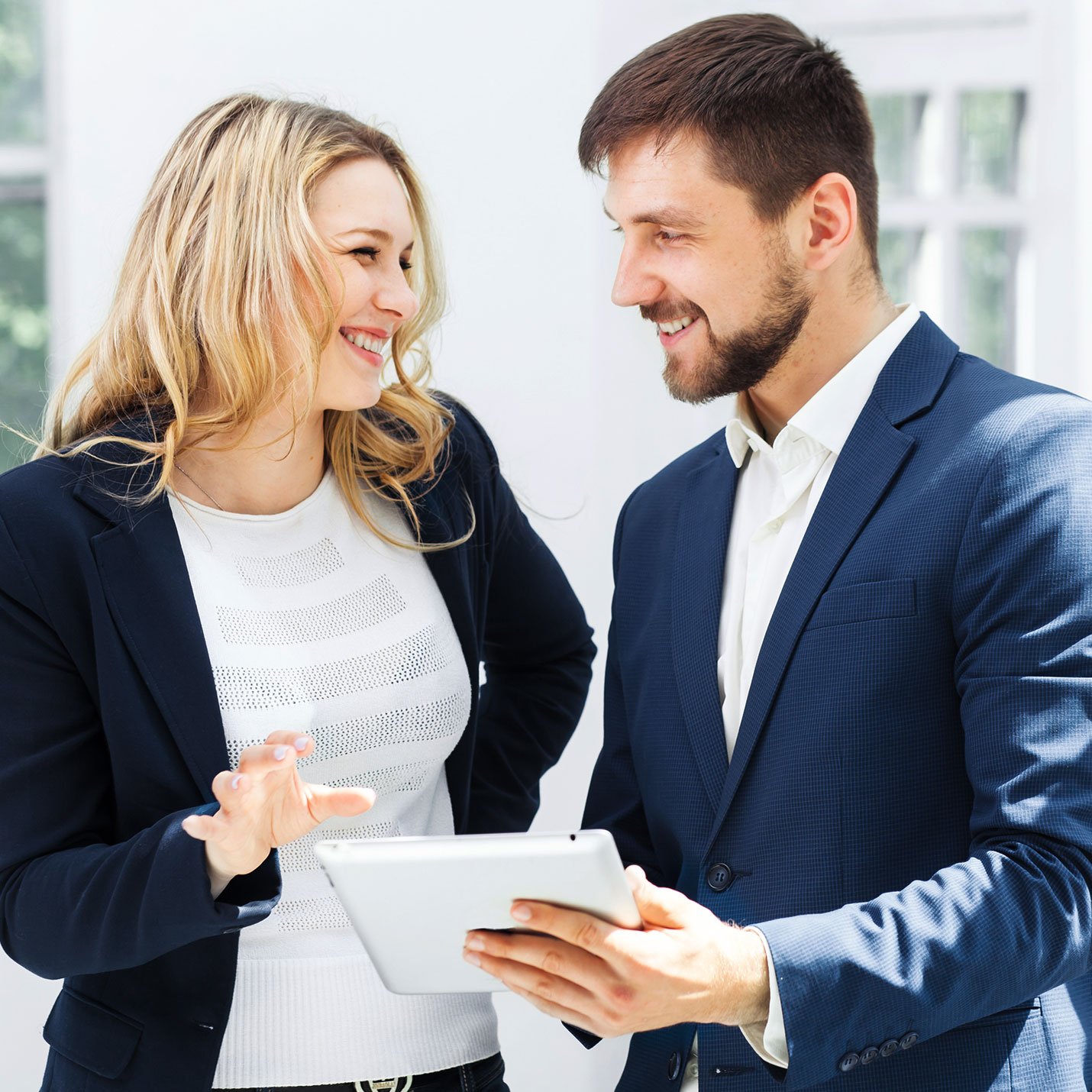 Couple in blue suit talking to each other