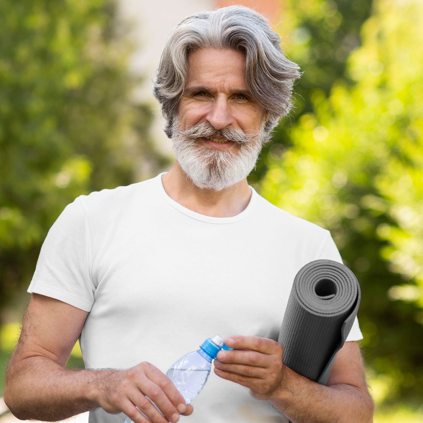 A middle aged man drinking post workout